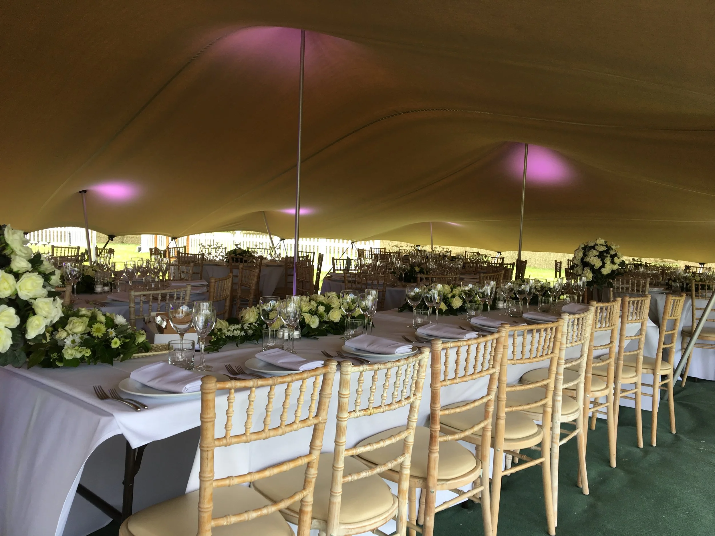 Wedding Breakfast under our Stretch Canopy, We havemany lighting effects to suit your tastes.