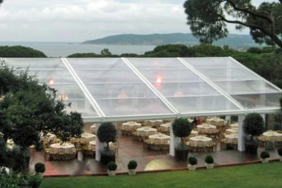 Clearspan Marquee with clear panoramic roofs on solid flooring.