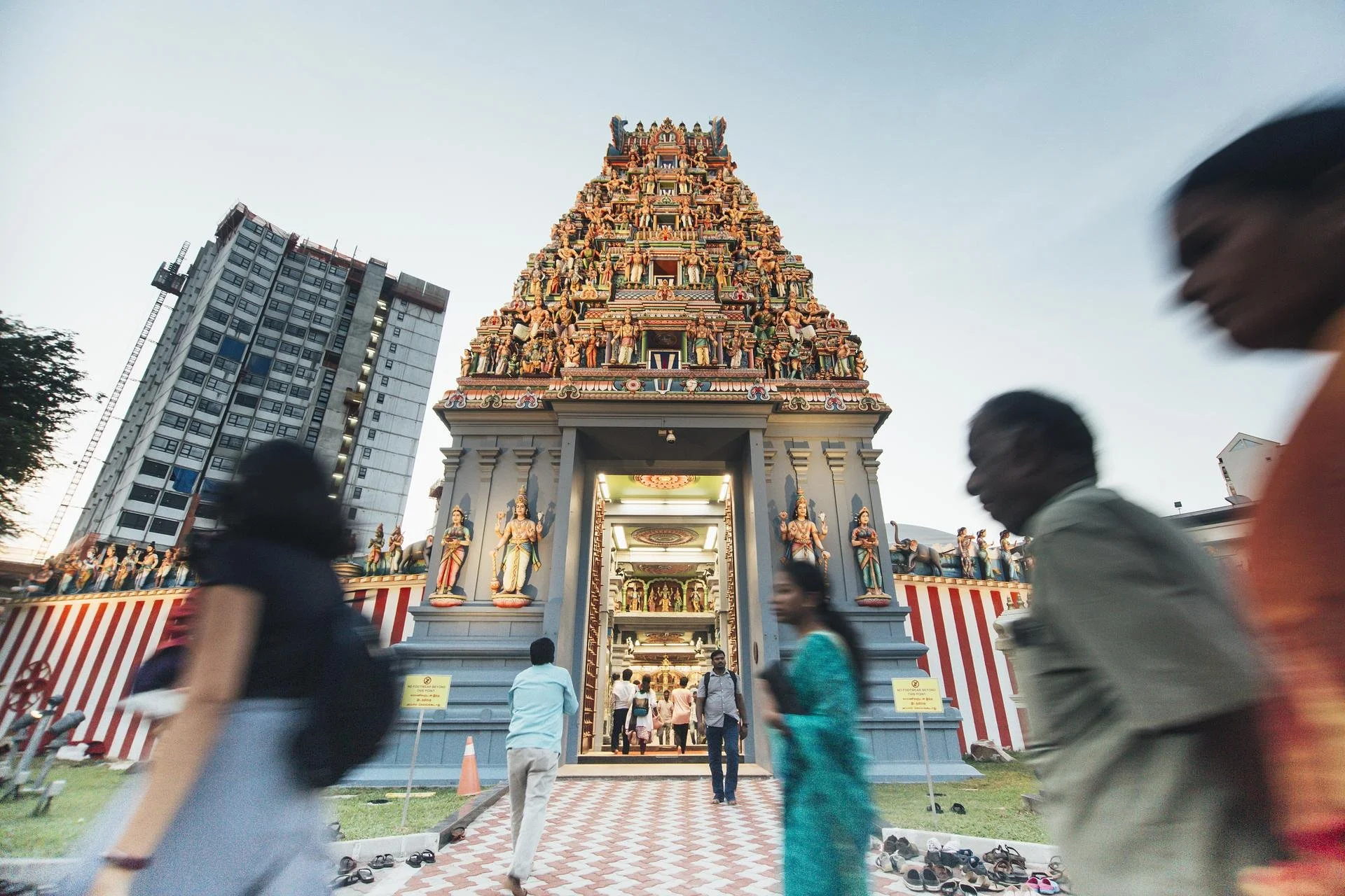 Sri Srinivasa Perumal Temple with people walking past