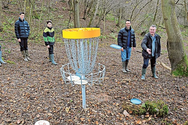 Spin doctors: Alex Wade and family play Frisbee Golf Photo: Jay Williams