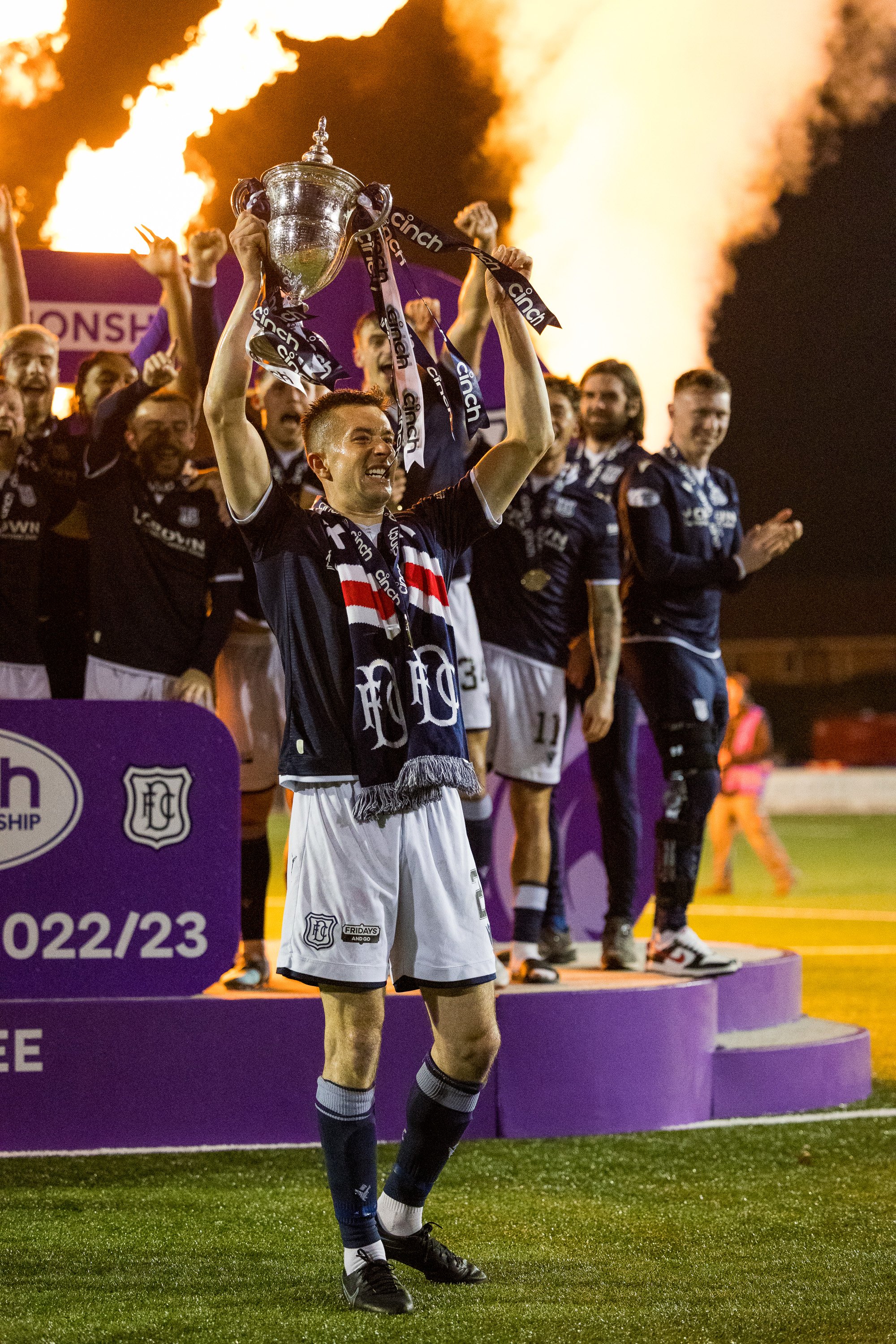  Dundee lift the championship trophy after victory over Queen’s Park in 2023 