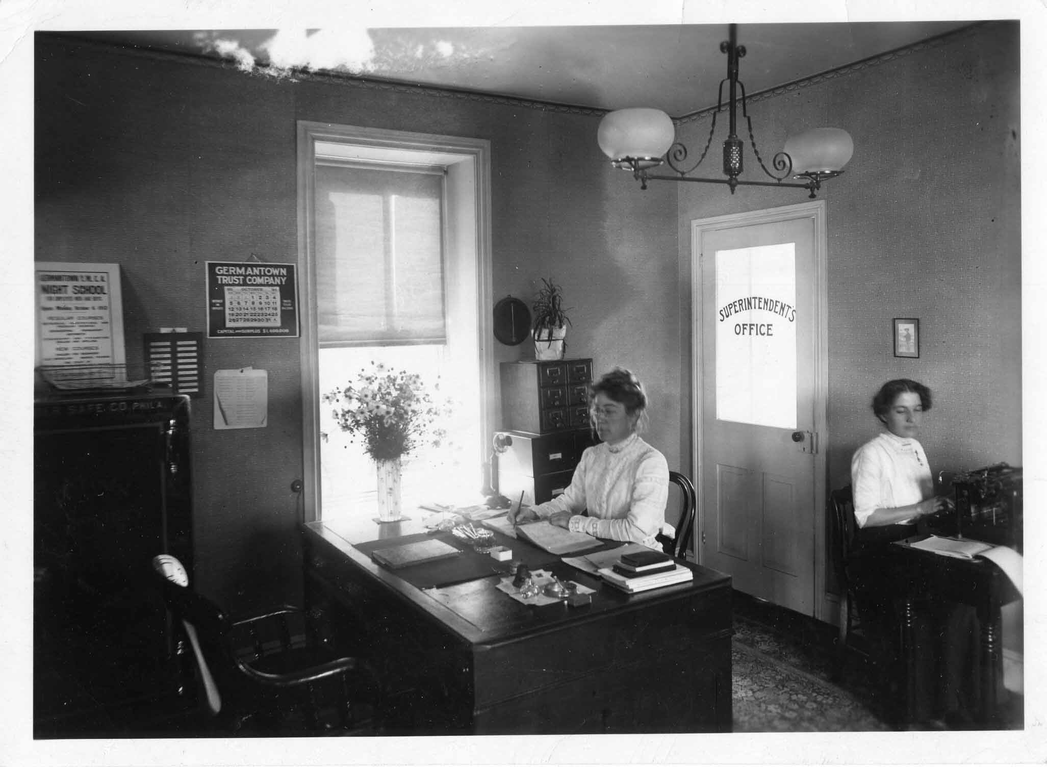  Figure 17: Interior photograph of the GRS headquarters on Harvey Street. Note the female visitors running the office, perhaps one is Kay. (GHS) 