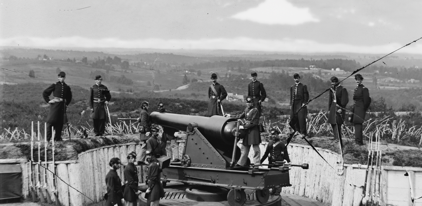  Photo of a gun at Fort Totten, looking northeast towards the vicinity of the cultural landscape. The vastly open landscape in the background is typical of conditions in the cultural landscape during and after the Civil War. (Excerpt from Smith 1865)