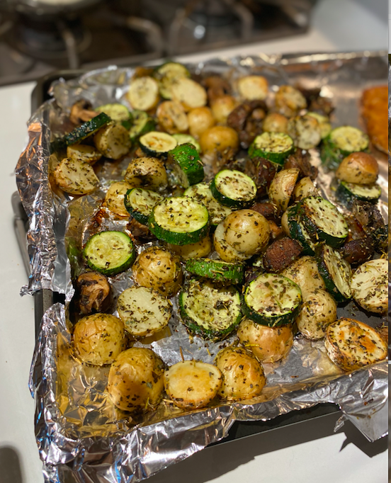 Italian Roasted Vegetables   Ingredients:  8 ounce baby bella mushrooms, halved  12 ounce baby white potatoes, halved  2 zucchini, sliced into 1/2 inch pieces  3 tbsp. olive oil  2 garlic cloves, minced  1/2 tbsp. dried oregano  1 tsp. dried thyme    Directions:  1. Preheat oven to 425 degrees F. Line baking sheet with foil.   2. Place vegetables and garlic in a mixing bowl. Toss in olive oil. Add spices.  3. Lay out vegetables on sheet pan and put in oven. Cook for 20-25 minutes, until browned but tender.