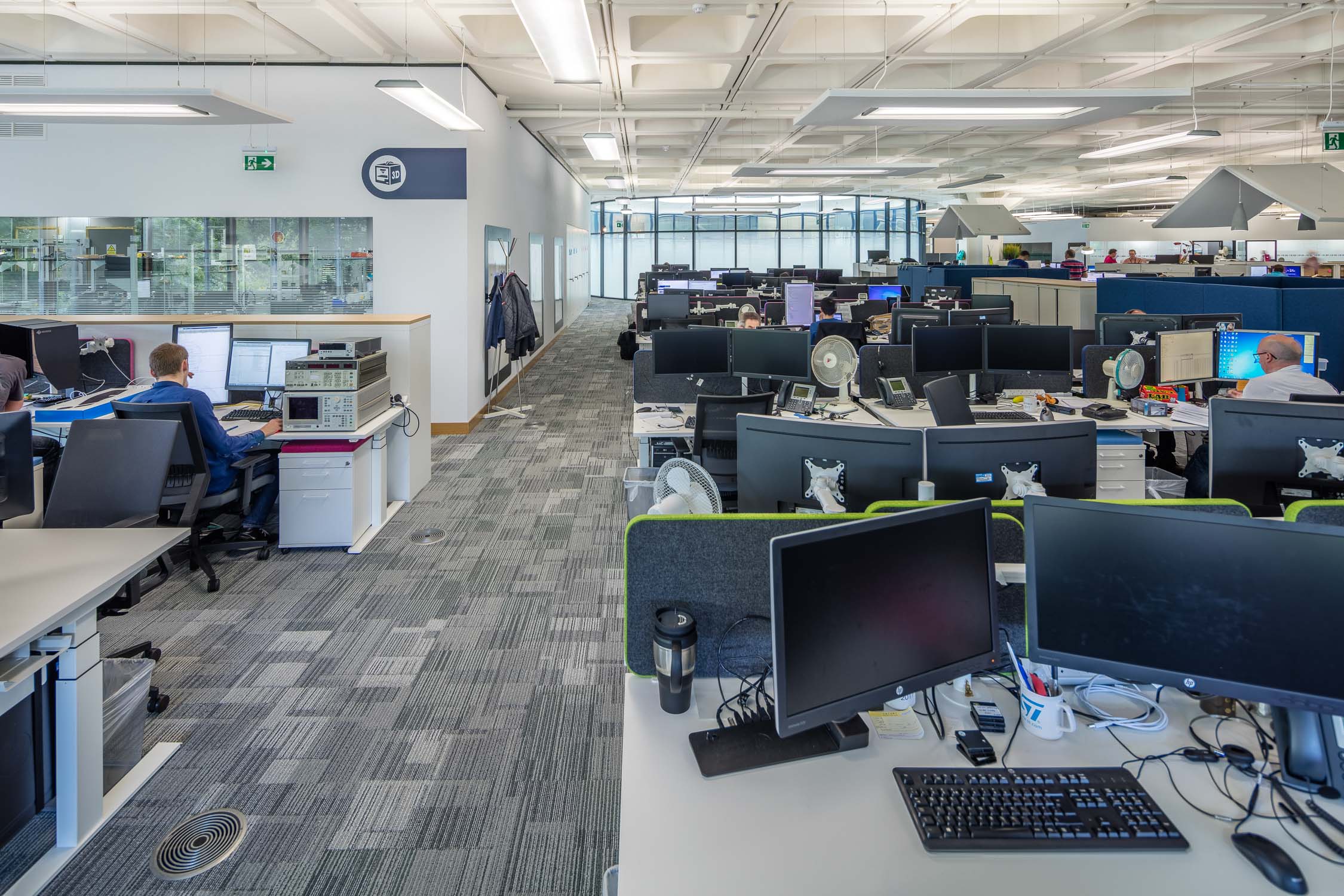 1600x800 sit-stand workstations with dual monitor arms, but most are left unused