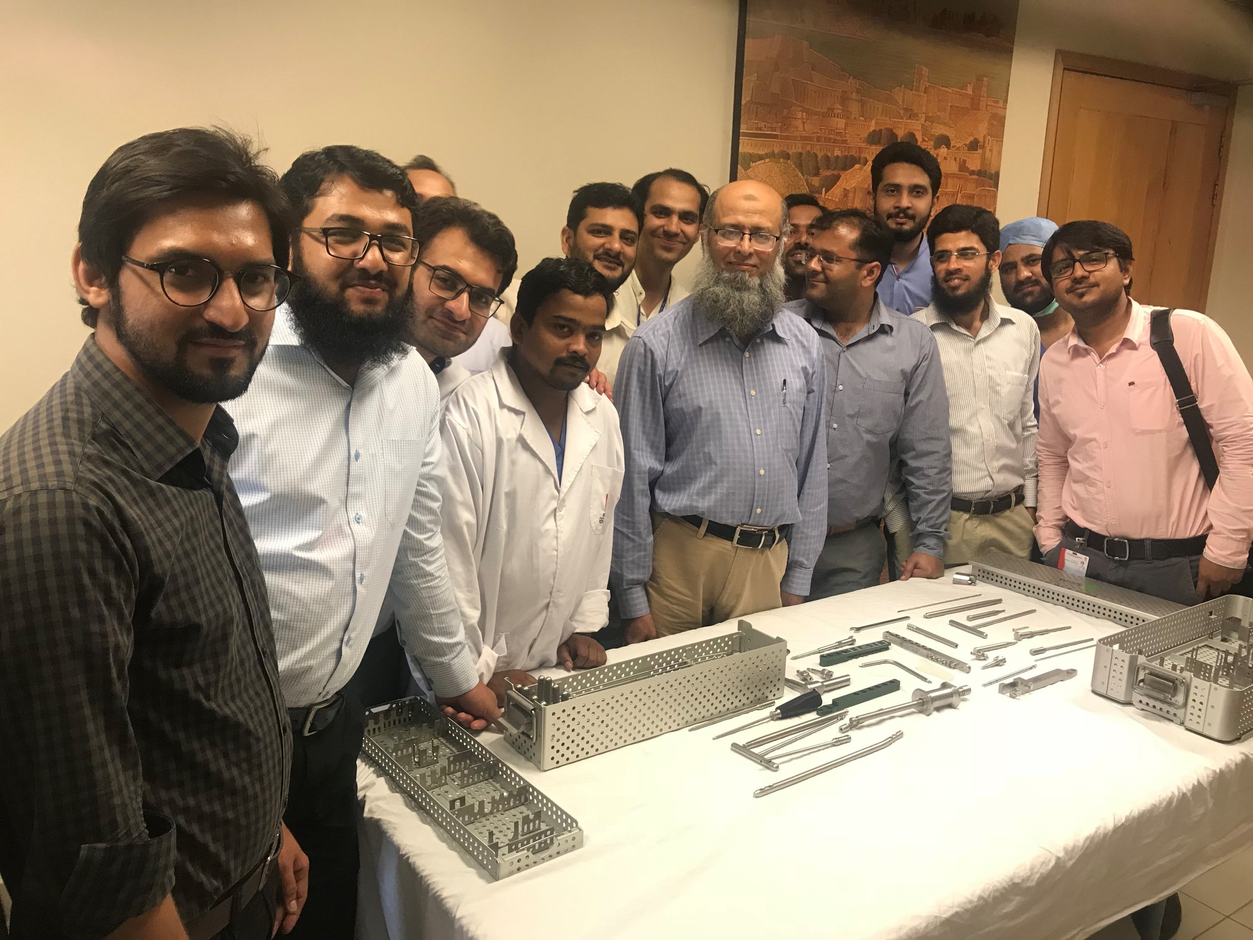 Staff at the Indus Hospital gather around their first SIGN Set!