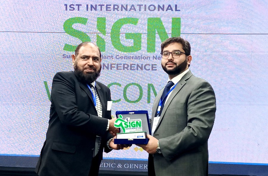 Dr. Faseeh Hsahab (right) and his father, Dr. Uddin Shahab (left), organized the 1st International SIGN Conference in Pakistan. The conference was attended by more than 60 surgeons.