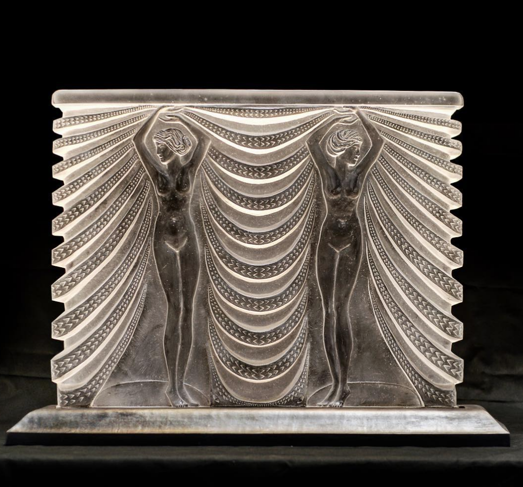 Custom leaded crystal fireplace cover (approximately 3’ x 4’) modeled after a Lalique vase design. Fabricated in collaboration with True Form Productions .
