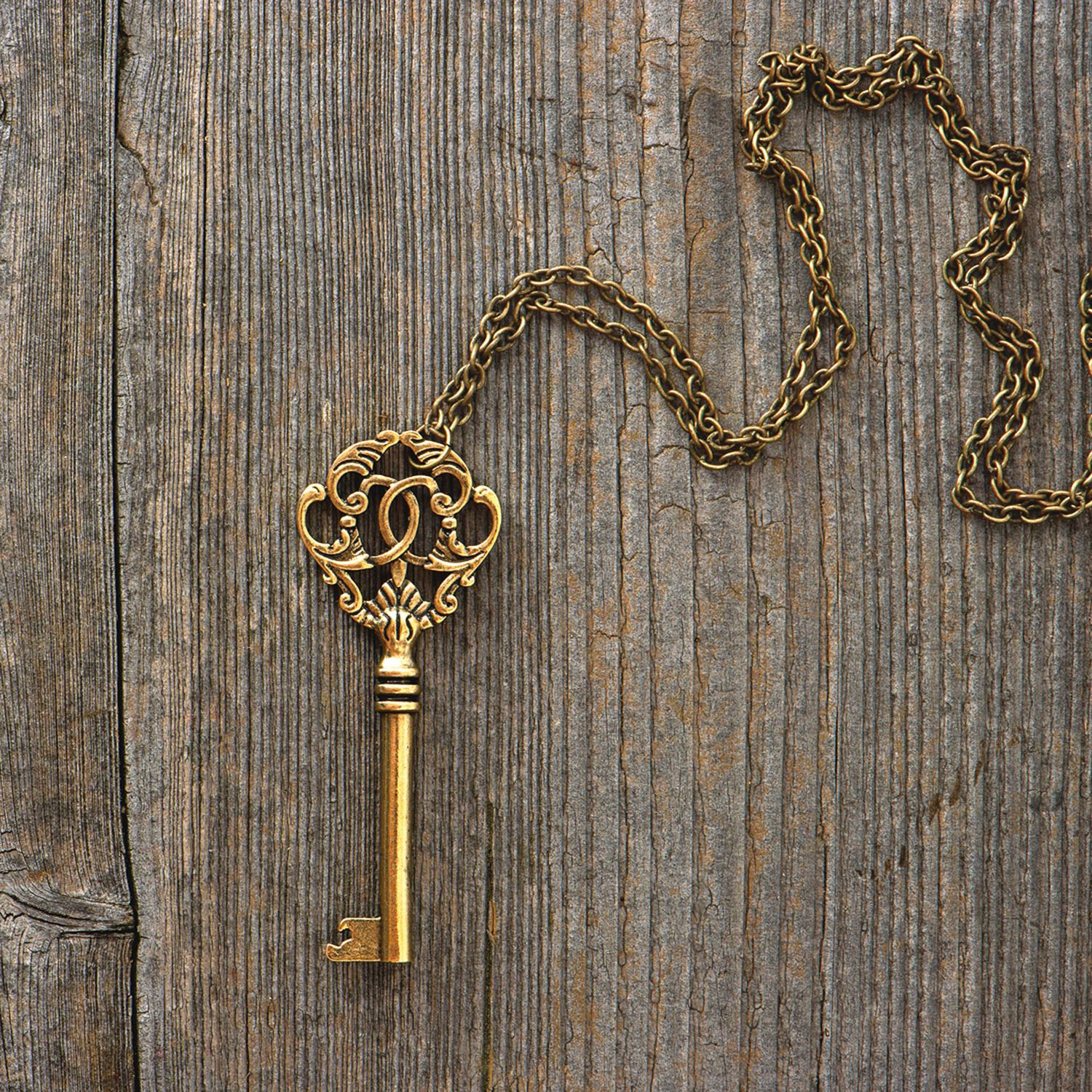Antique Golden Key on Wood.jpg