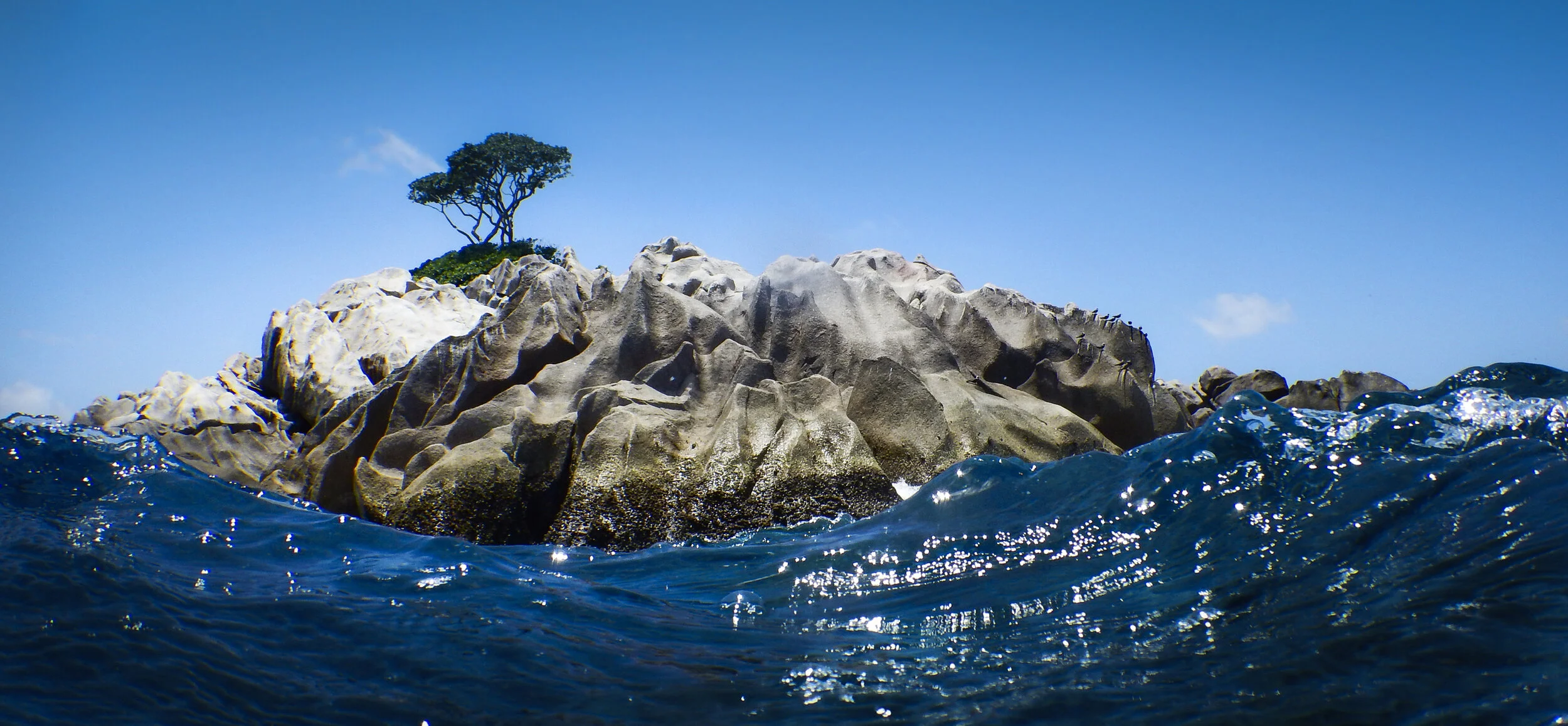 Rough sea pondering tiny island - Barbara Ebner-3781.jpg
