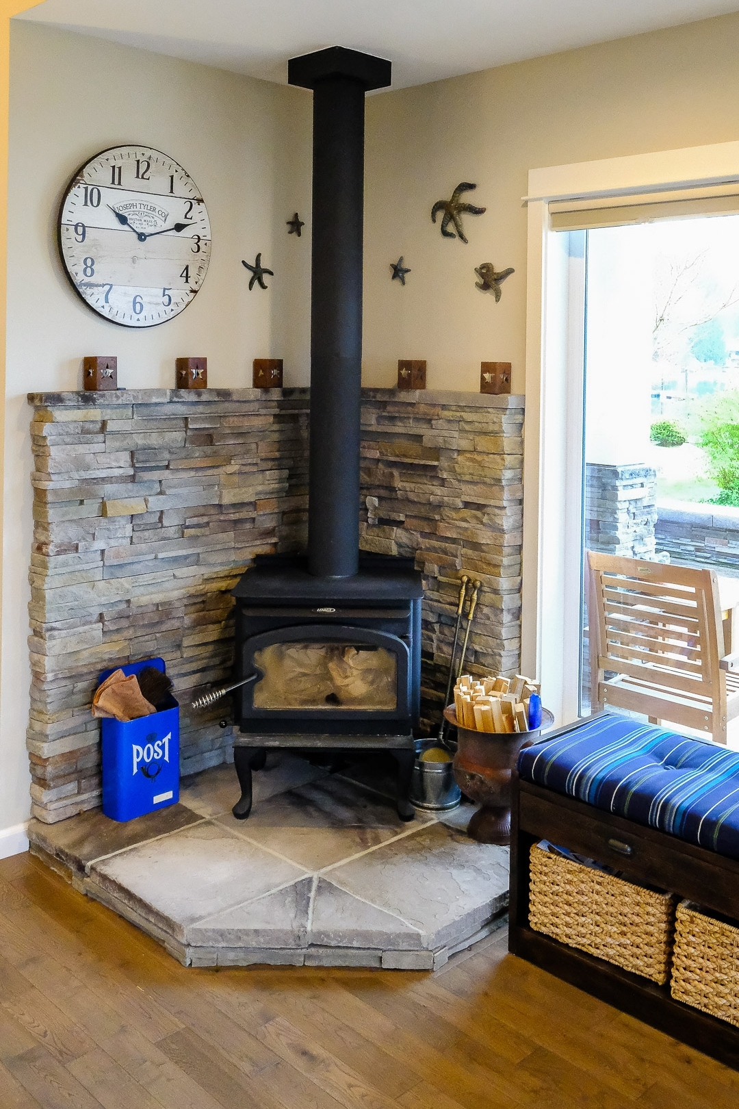   Freestanding Wood Fireplace with Stone Back walls &amp; Slate Base  