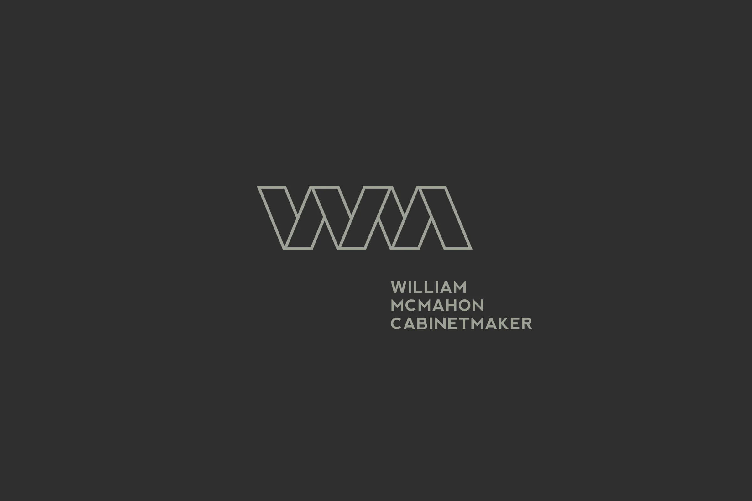WMC_Logo_Folio_Charcoal-tiny.jpg