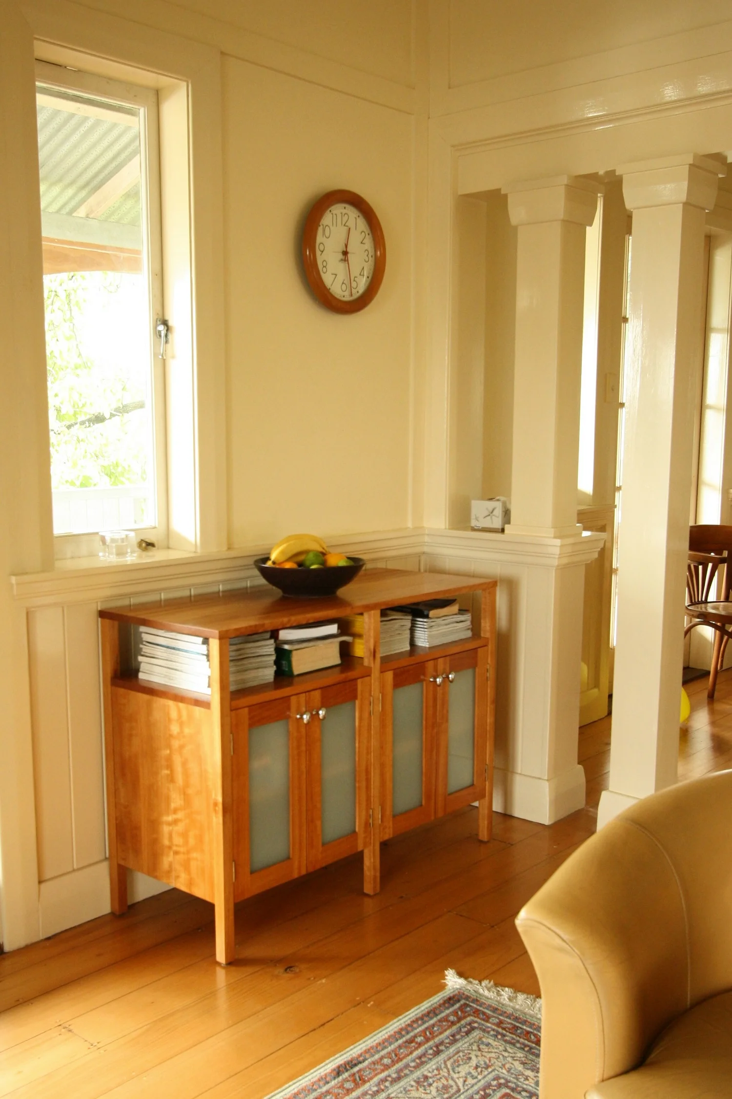 A traditional theme in this Queenslander is carried through with the use of Queensland Maple for this sideboard with frosted glass