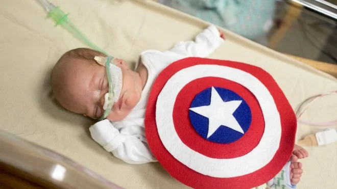William Behnke dressed as Captain America. Image copyright: SCHAUMBURG PHOTOGRAPHY AND MARCH OF DIMES.