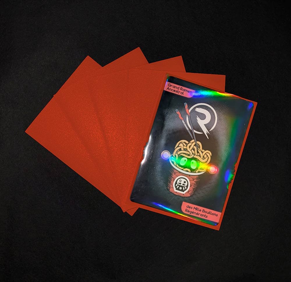Matte-sleeves-orange-effet-foil-card-repliquant.jpg