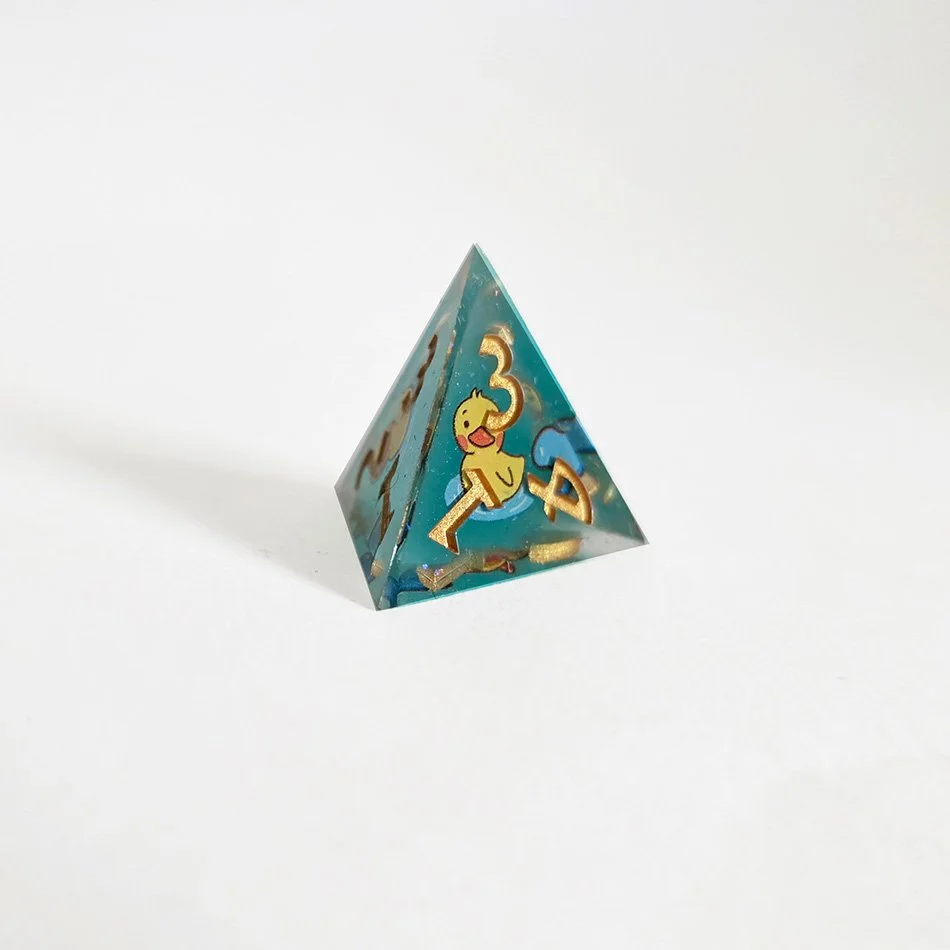 canard-resine-repliquant-set-7-dice-d4-rpg.jpg