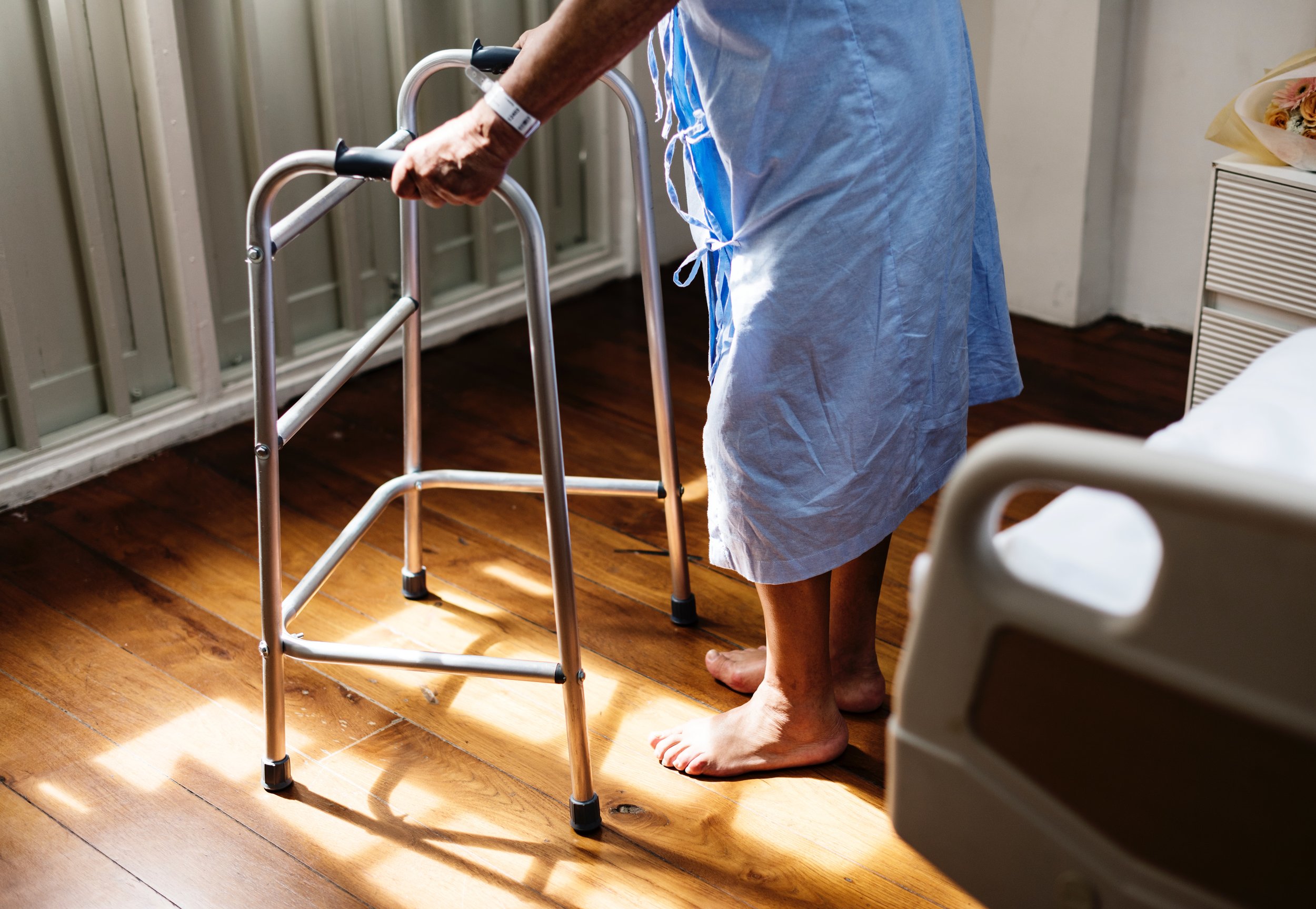Hospital patient using a walker