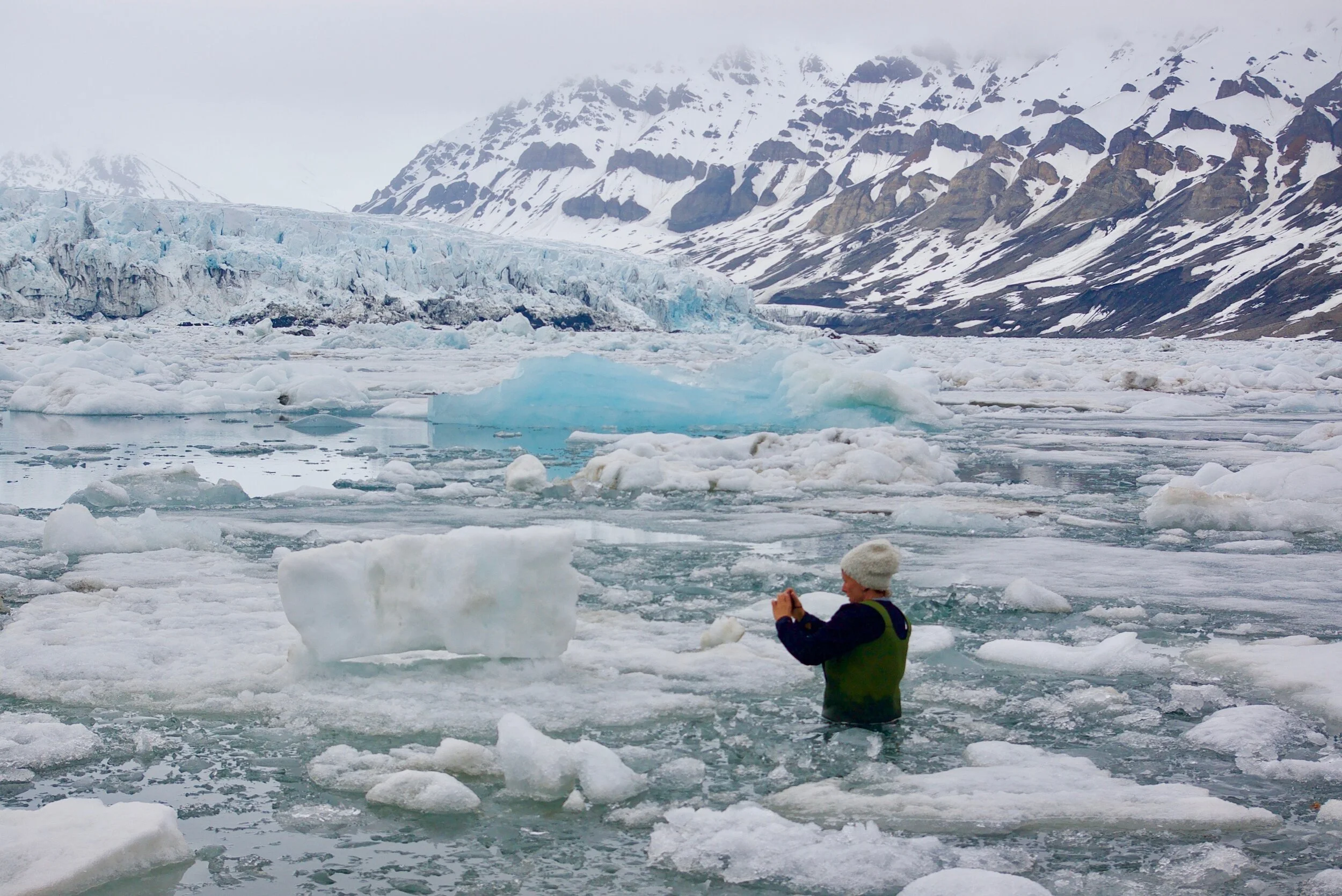   Recherchebreen Glacier: scanning ice in the glacial lagoon.                                                                       (image: Ryan Sloan)  