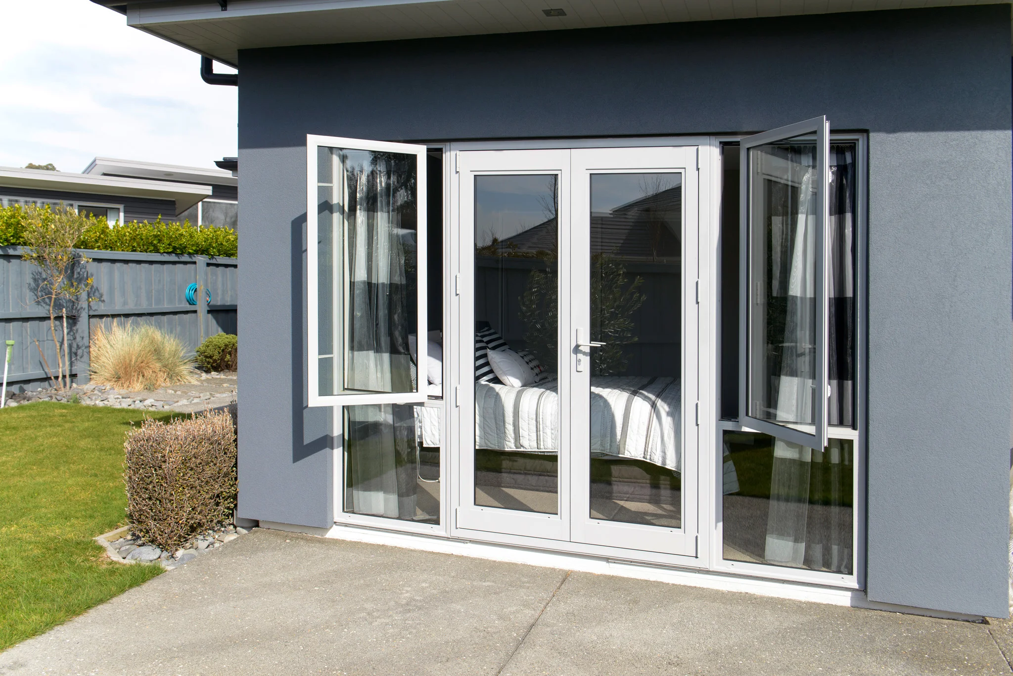 WINDOWS AND DOORS . Windows: Fixed, Horizontal sliding, Hinged, Bottom Hung, Top Hung, Vertical sliding, and Tilt & Turn windows Doors: aluminium glazed swing, aluminium louvers, sandwich panel, bi-folding, sliding, and frame-less doors.