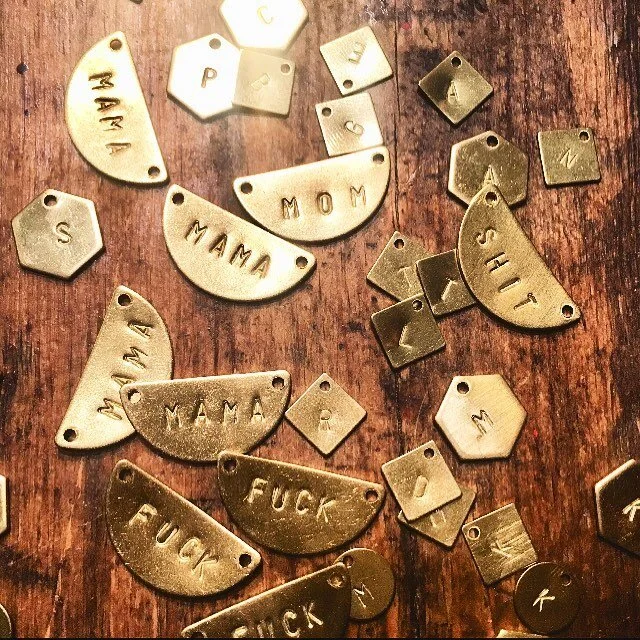 Sean&rsquo;s working hard on initial necklaces, Mother&rsquo;s Day and swear word necklaces galore! Can&rsquo;t wait to restock these.