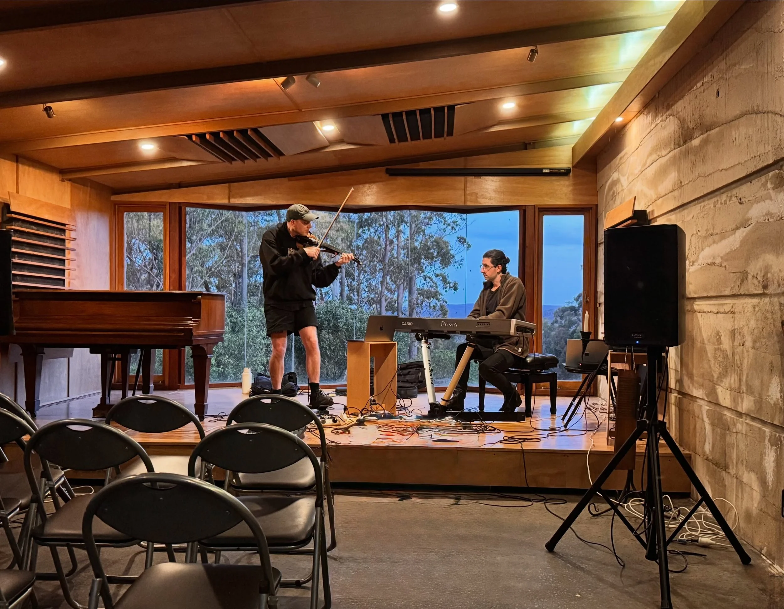 At work during their residency! Finn Idris (violin) and Alex Raineri (keyboard) 

Alex and Finn spent a brief but super productive residency at Harrigans Lane, developing their Helcarax album project. Three days of stunning spring weather to inspire 
