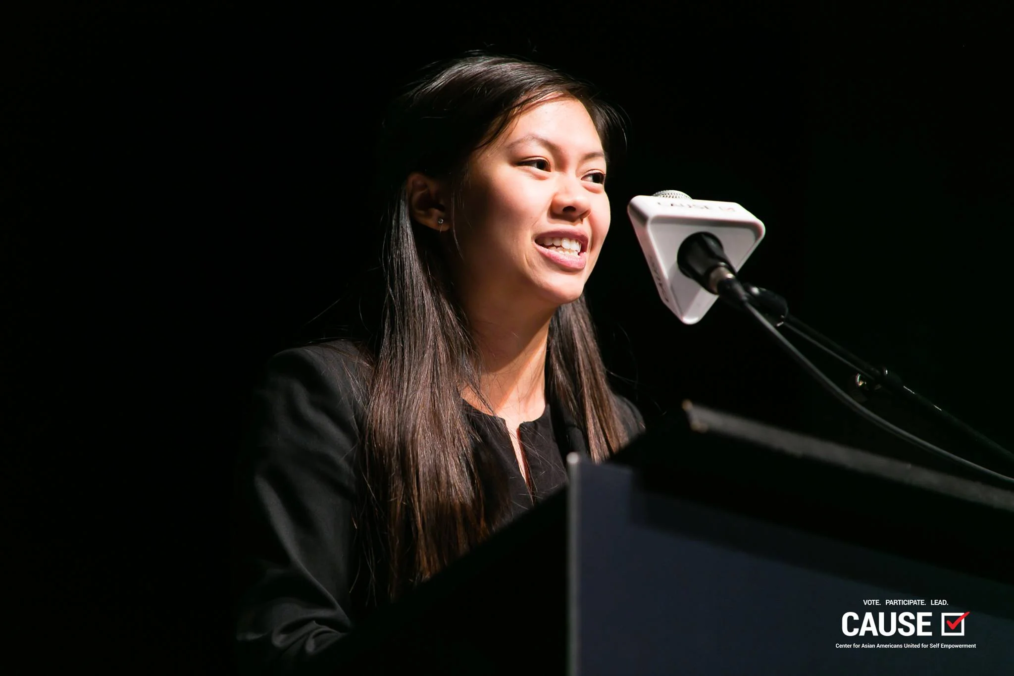 Leann Pham speaking at the 2018 Leadership Academy Graduation