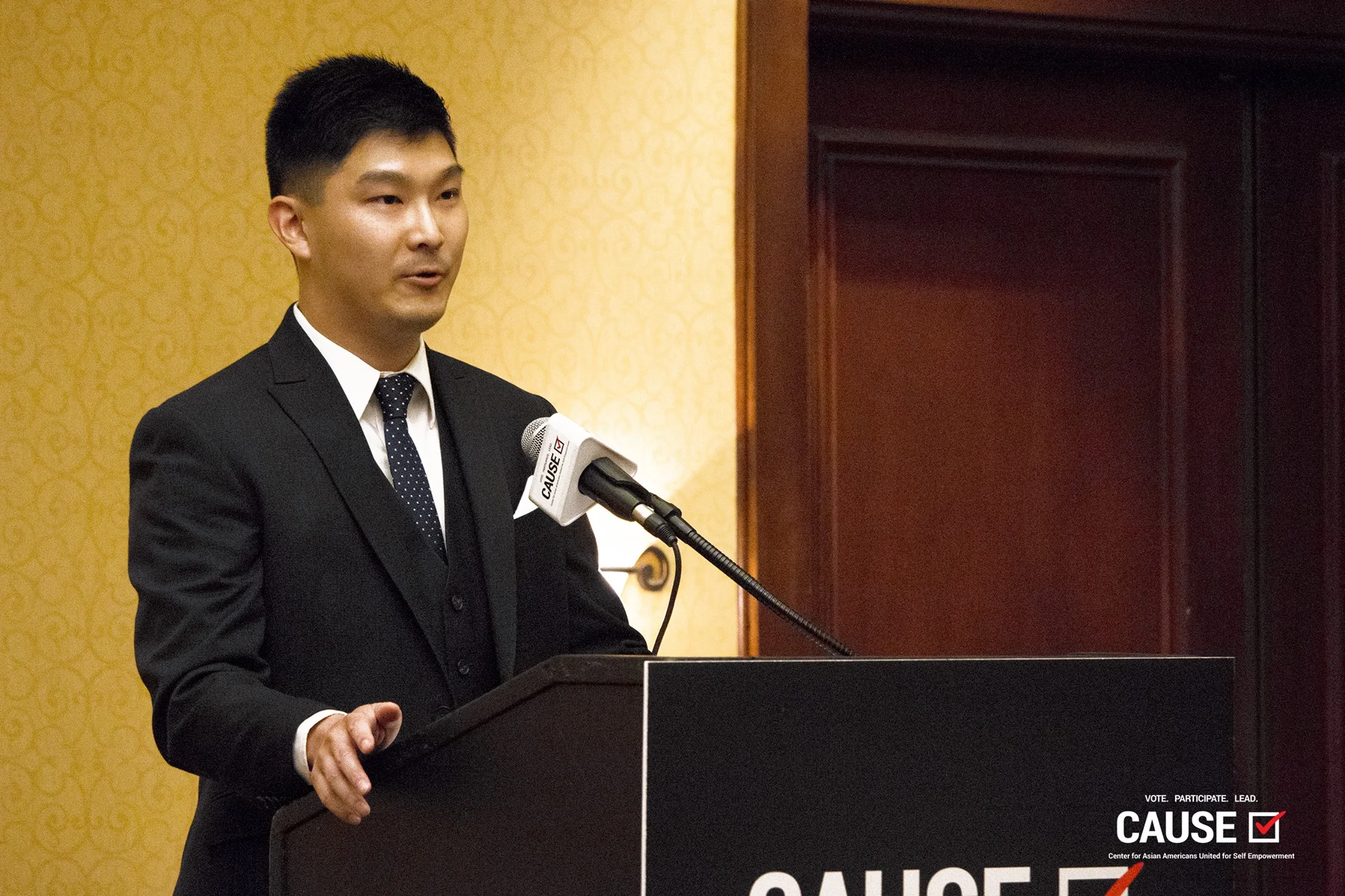 Adam Hsu speaks at the 2018 CAUSE Leadership Institute Graduation