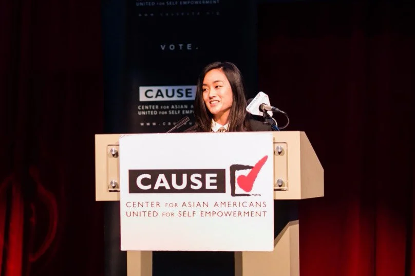 Erika Zheng speaking at the 2016 CAUSE Leadership Academy Graduation