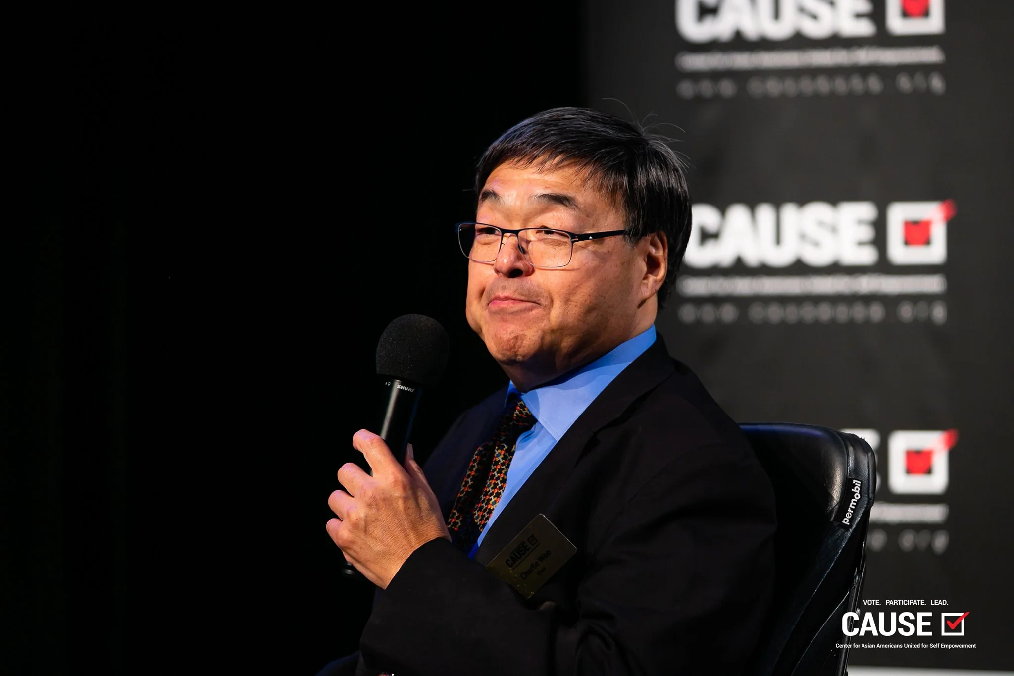 Charlie Woo speaking at the 2019 CAUSE Leadership Academy Graduation