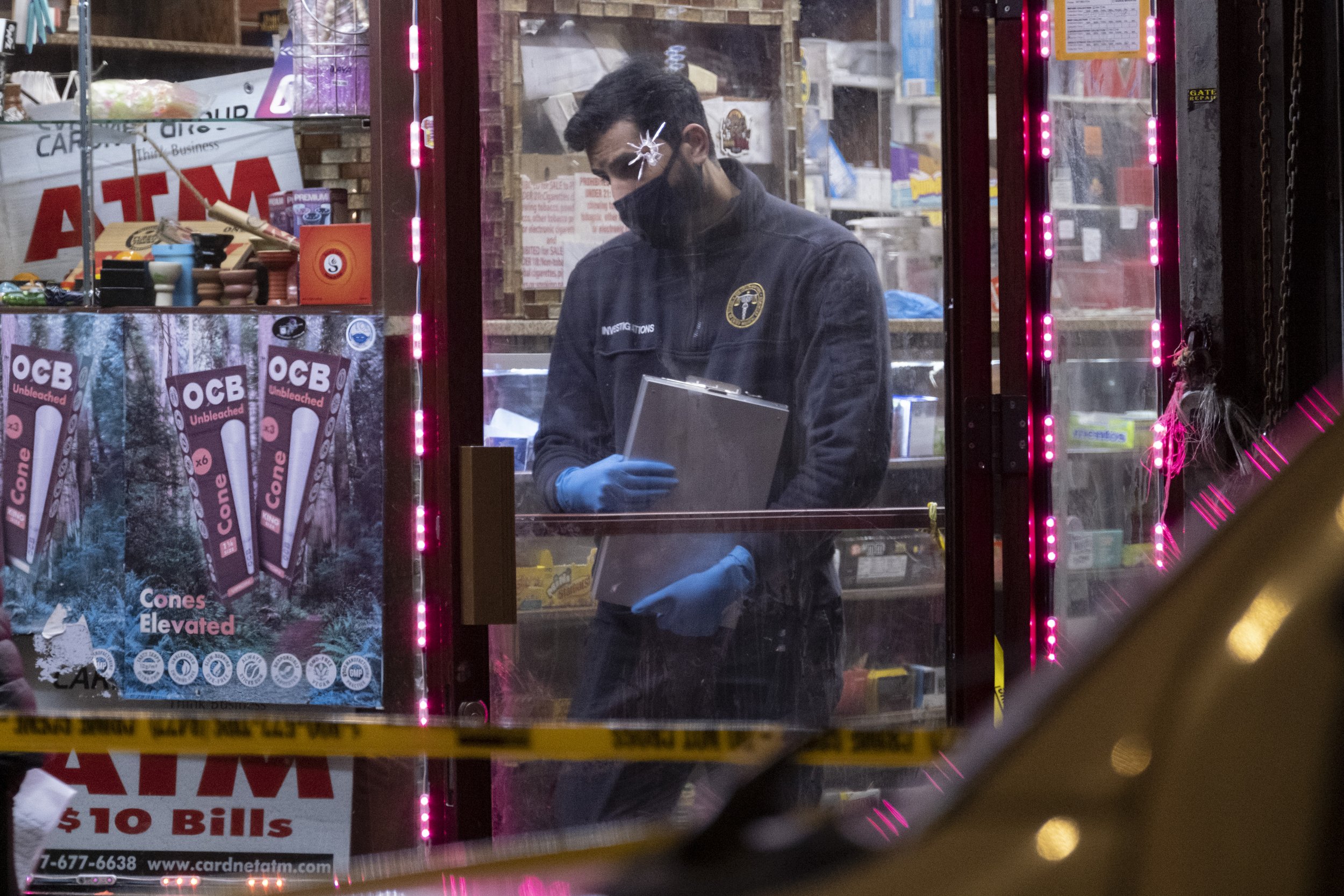  May 3rd, 2022 - Bronx, NY: Crime scene investigator at the scene of a shooting where 25-year-old Edison Cruz shot and killed a 31-year-old bat wielding man in a dispute outside a bodega at 6 East Burnside Ave. that also wounded two other bystanders 