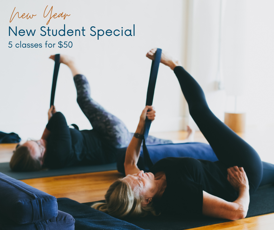 Two yogis stretching their legs on their backs, with text that reads "New Year, New Student Special; 5 classes for $50"