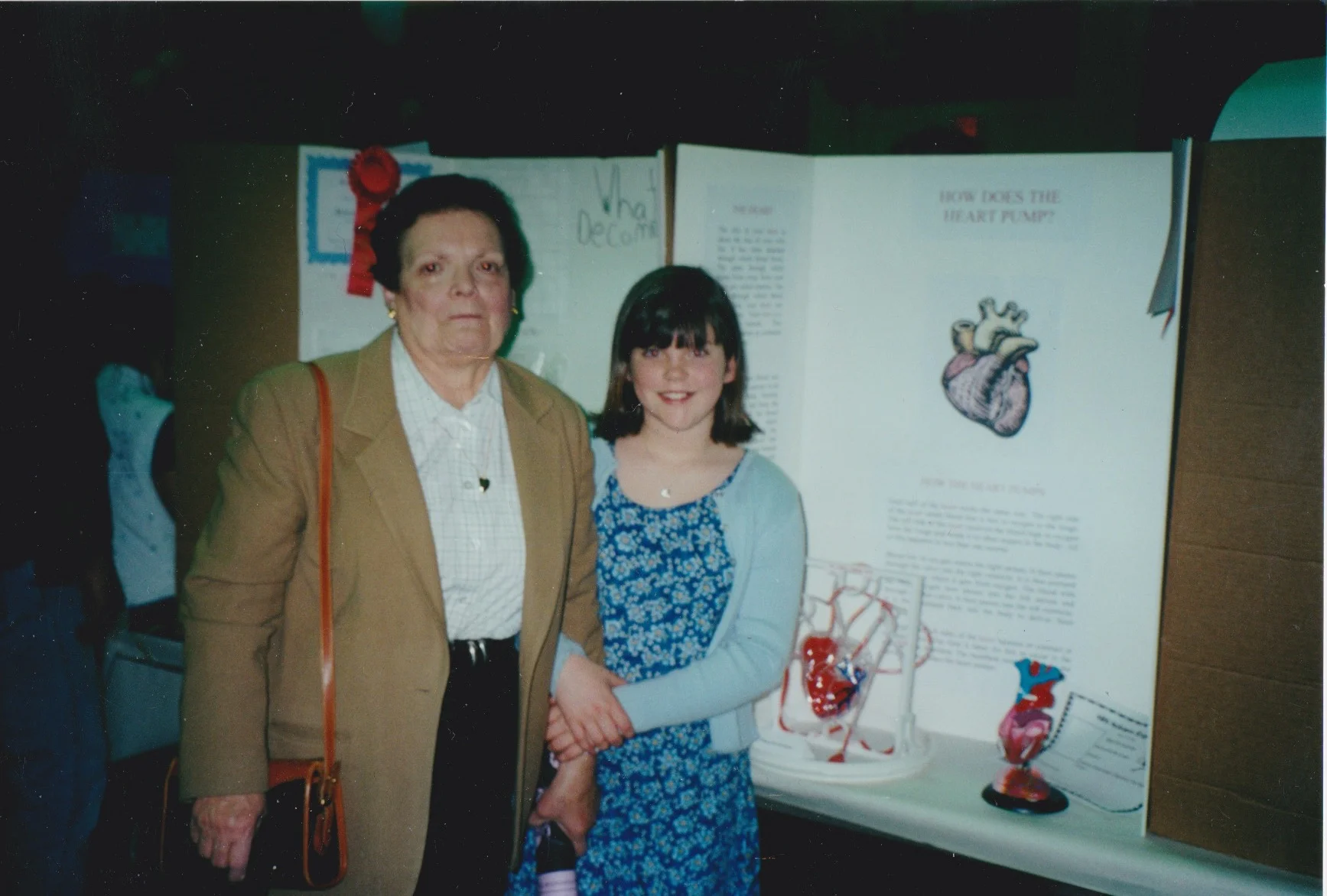  Me (at 12 years old!) and my Grandma at my science fair. I had created a working replica of the human heart to show how the heart pumps blood throughout the body.  