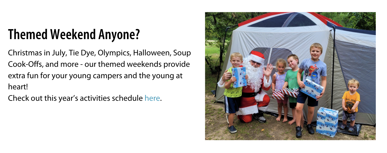 Santa with kids in front of tent