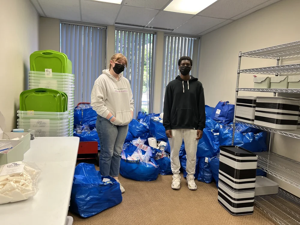 Interns organizing materials in our STEM Kit office (Copy)