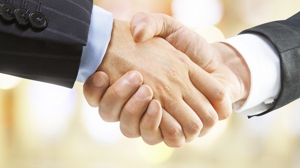 SD+SPorts+group+handshake.jpg