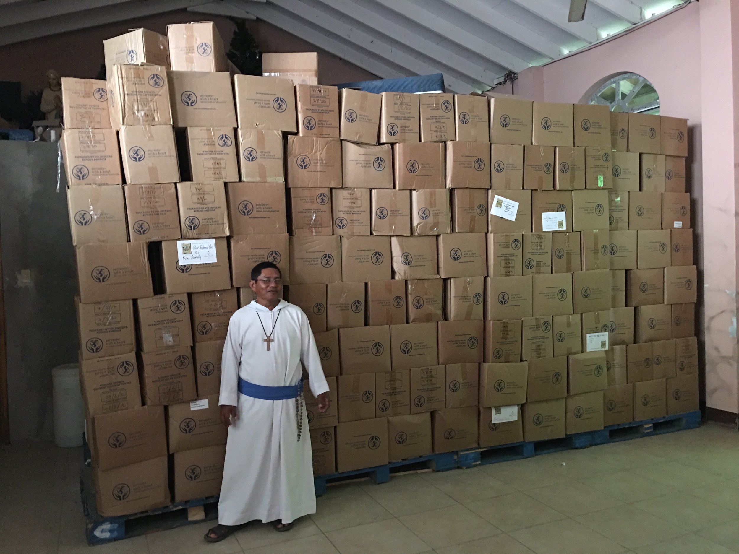 Meals Boxes with Father Max .jpg