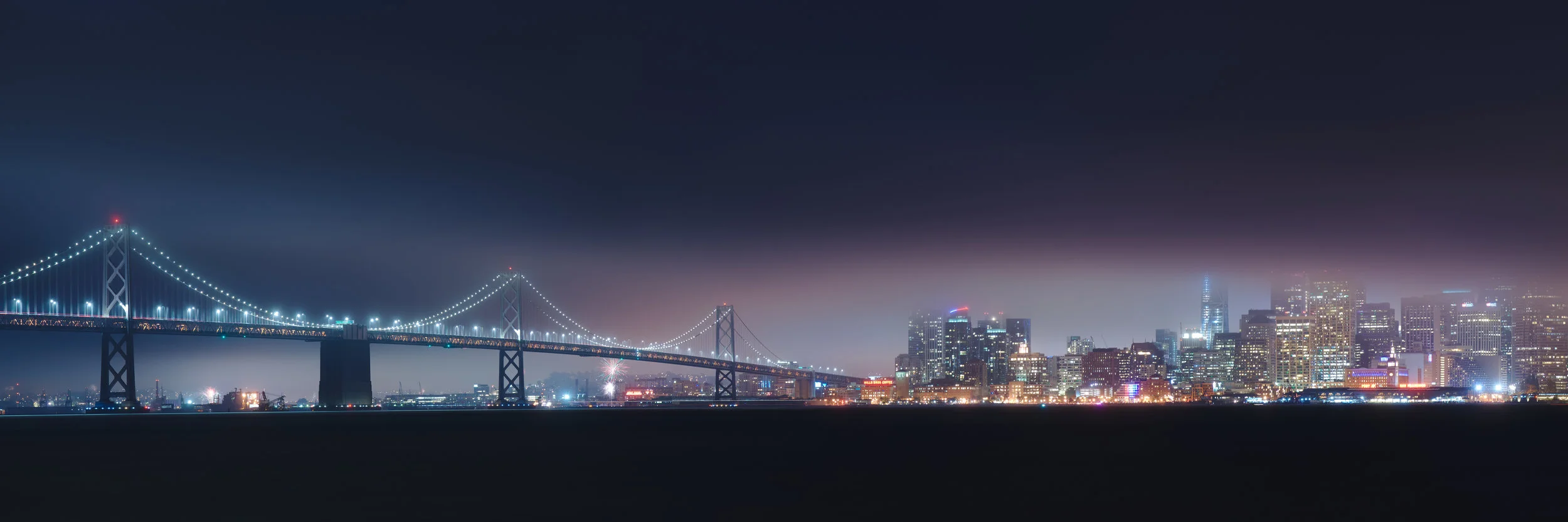 San_Francisco_skyline_on_a_foggy_4th_of_July_night.jpg