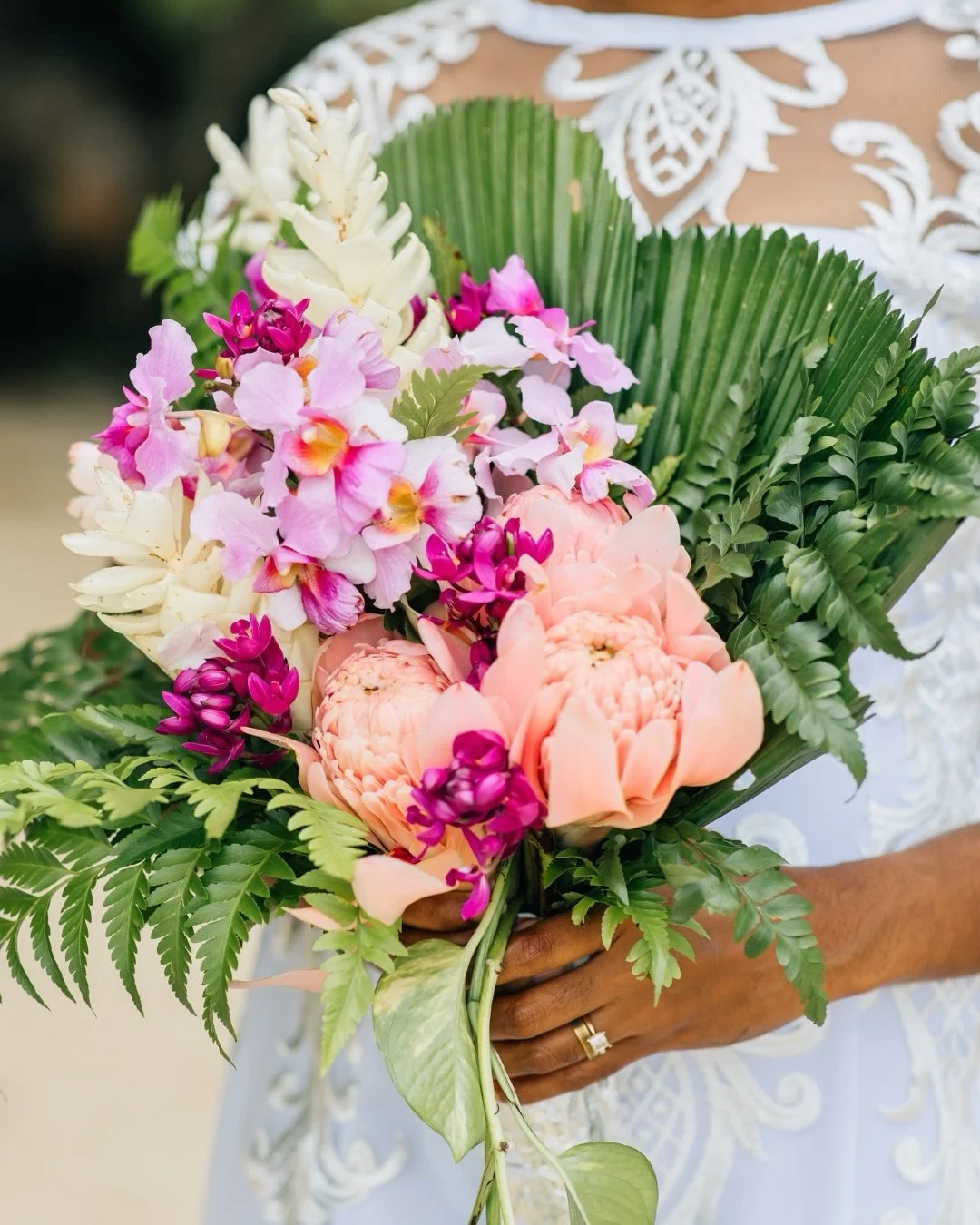Palm trees, matching florals, and a couple who couldn&rsquo;t stop laughing. This #TBT has been on repeat in our camera roll all week. 🌺
.
.
.
.
#KansasCityWeddingPhotographer #fromtheislandtothemidwest #BeachWedding #KCMOWeddingPhotographer