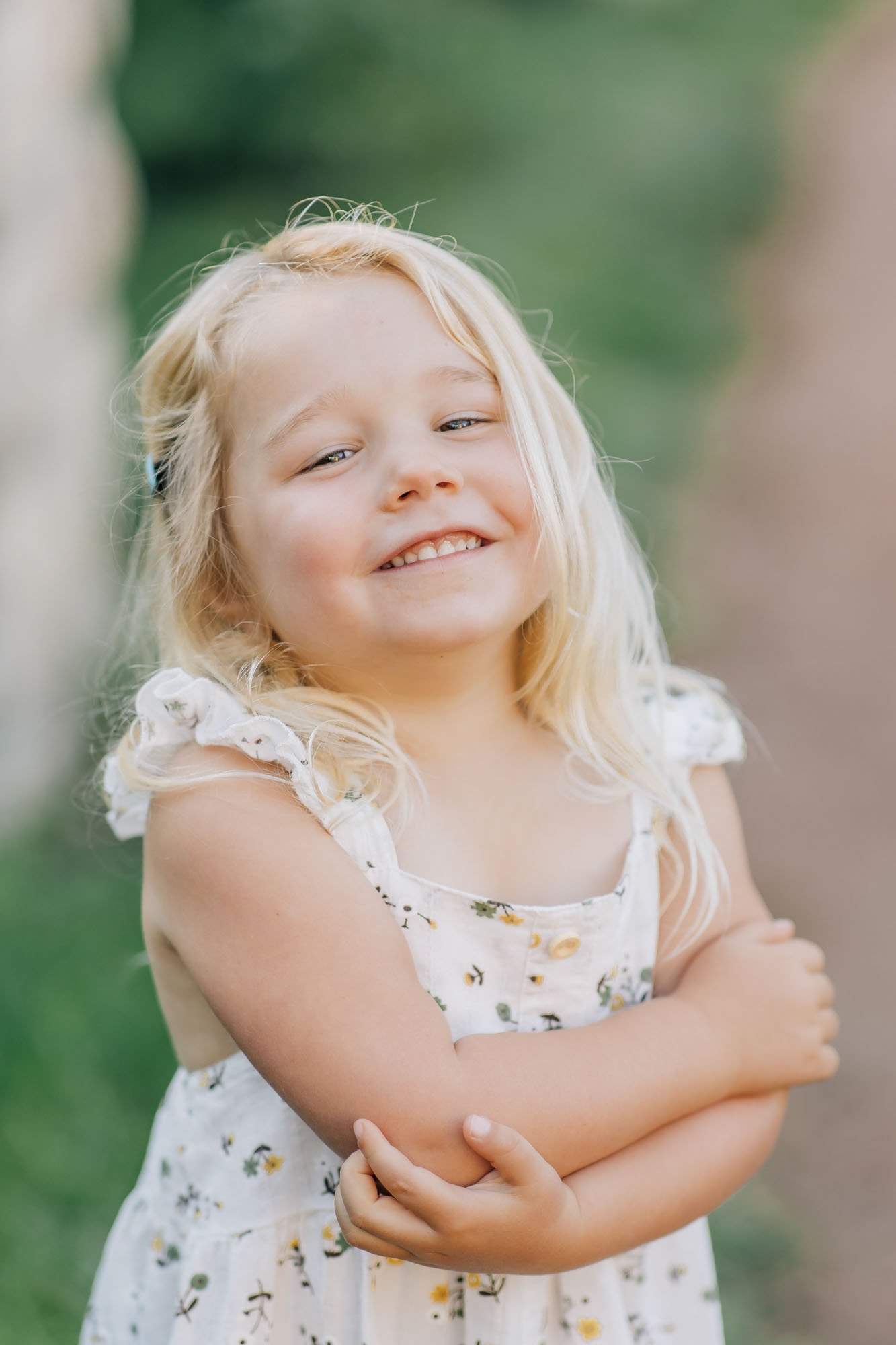 smiling young girl in garden setting