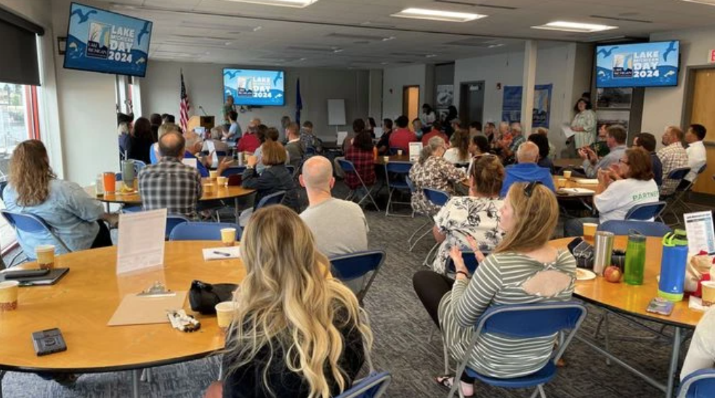 Attendees engage with speakers and conservation leaders during Lake Michigan Day 2024 at the Wisconsin Maritime Museum, celebrating collaboration to protect and restore the Great Lakes Basin.