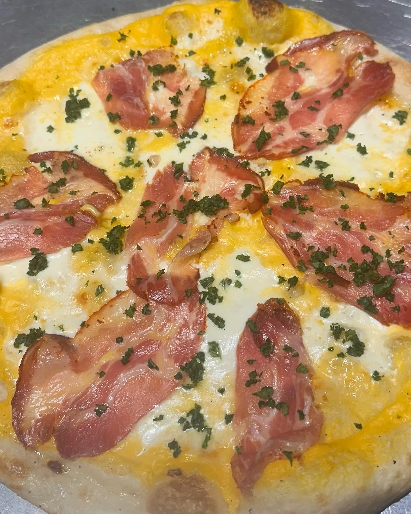 Introducing our newest pizza the 2 A.M.! 
Featuring hot coppa, burrata, provolone, butternut b&eacute;chamel  sauce and topped with shredded kale. #eatdrinkplaynice #cookbook2.0