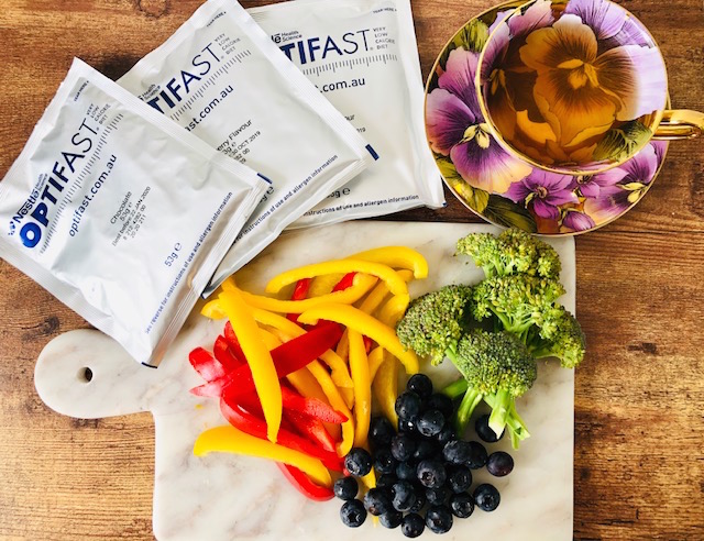 A typical daily meal; 3 Optifast shakes, 2 cups of vegetables and for the days when I’m a good girl who goes to the gym I get to eat that little tiny bit of fruit.