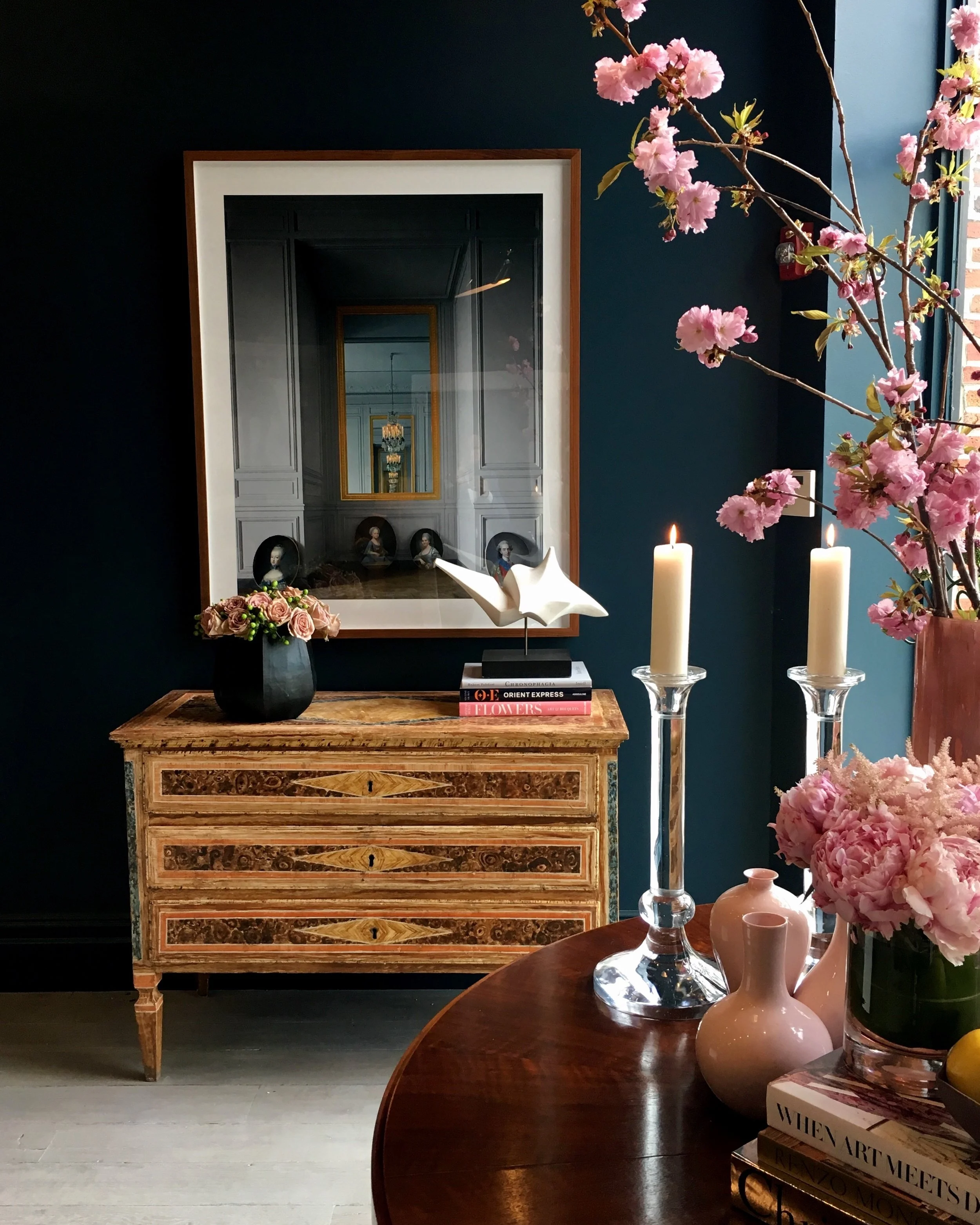 Antiques, art, and accessories share space in the showroom.