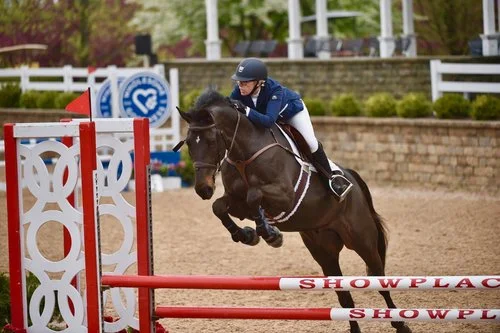 Rebecca and Enzo competing at Lamplight Equestrian Center
