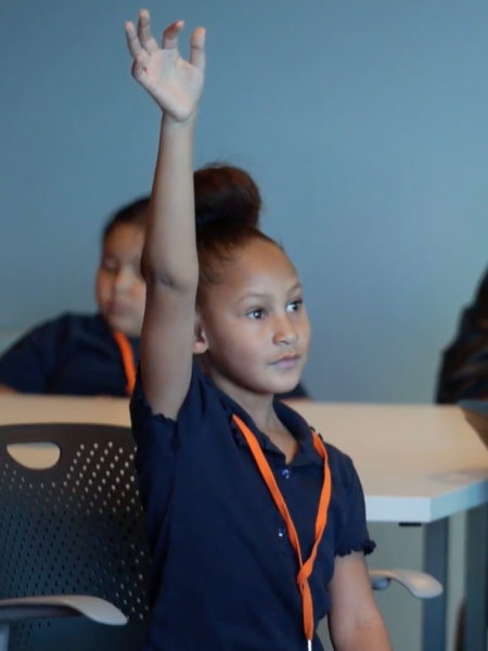 kcua kid raised hand crop.jpg