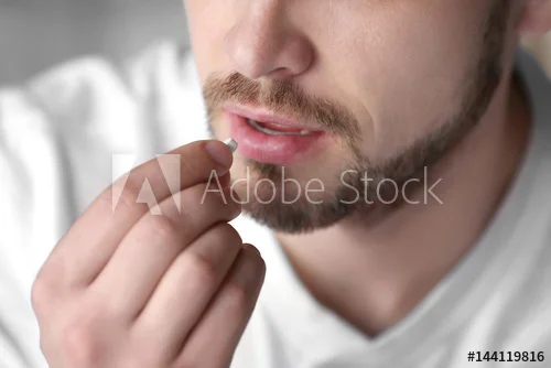 man taking pill.jpg