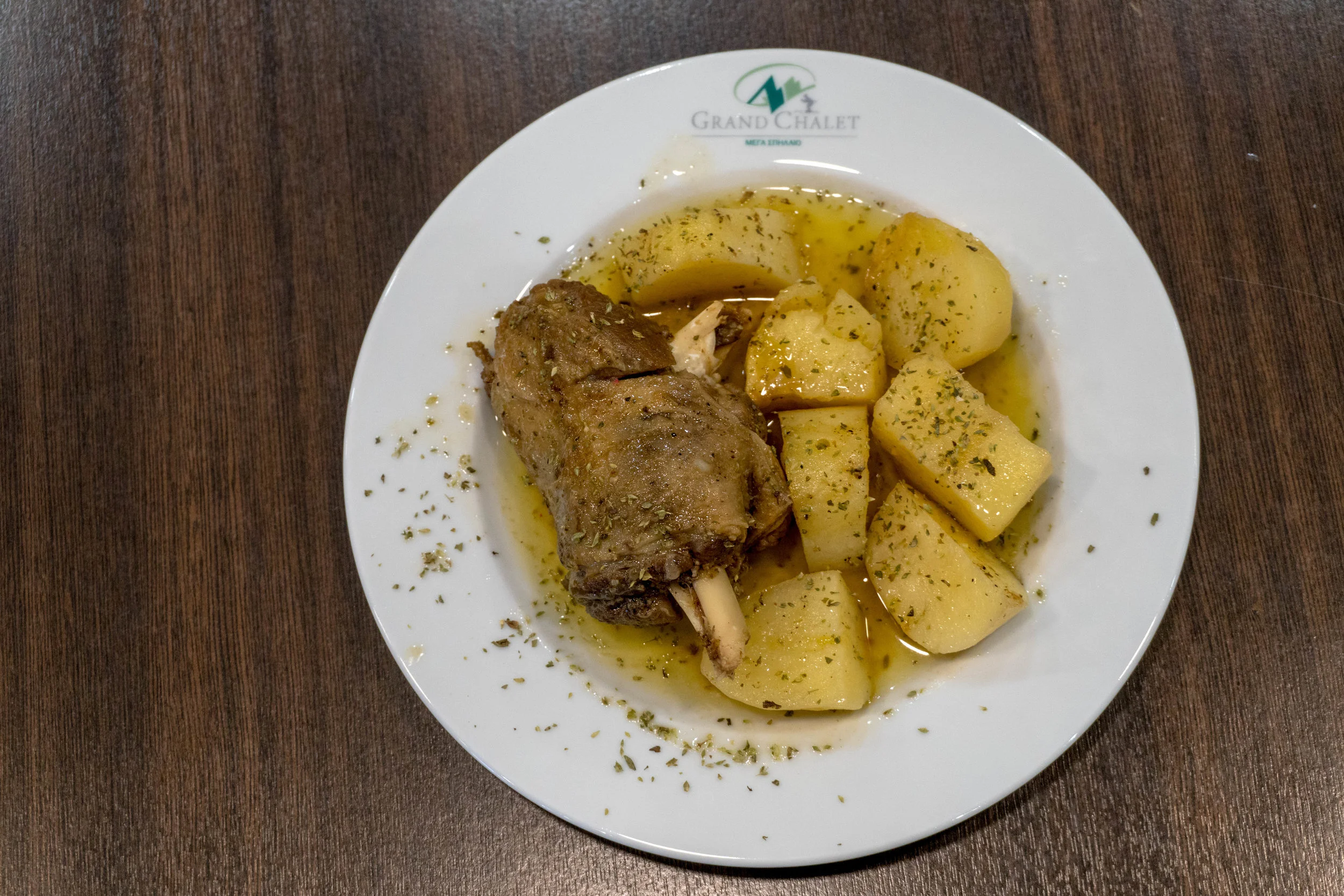 Lamb with oregano and roasted potatoes on the side
