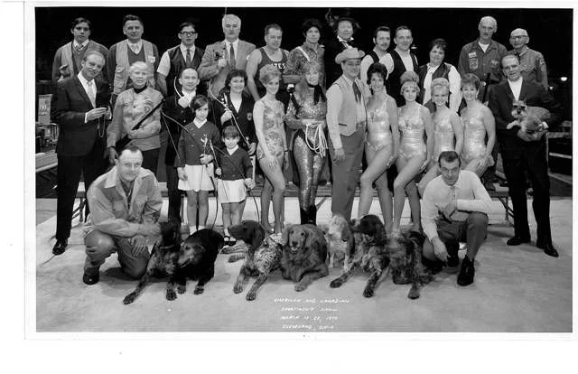 Sam at the 1970 Sportsman Show (top right corner).
