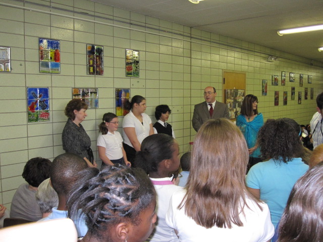Left to right: Judy Stryffeler – Red Seal H/R Manager, students representing 4th, 5th and 6th graders, Ward 19 Cleveland Councilman Martin Keane and Sheree Ferrato.