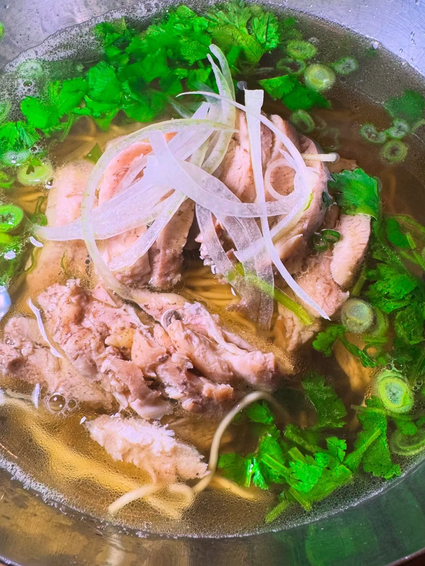 Chicken Pho (Phở g&agrave;)

My better half was under the weather so I made some chicken soup. Vietnamese chicken pho. Boiled some chicken bones and thighs along with toasted seasonings for the bouquet, with charred onion and ginger. Fish sauce for t